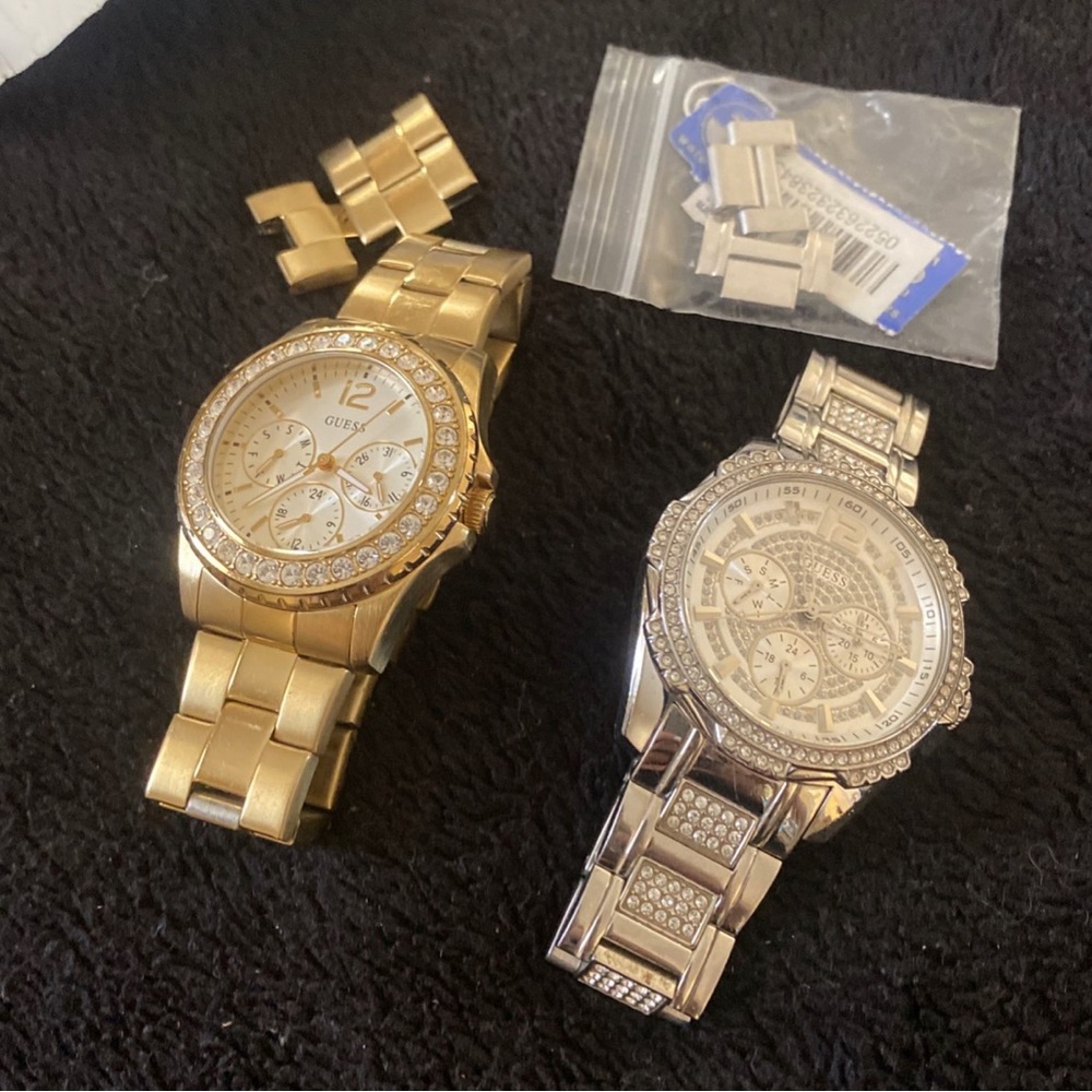 2 women’s GUESS watches